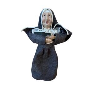 Singing nun figure Christmas holiday caroler folk art classic